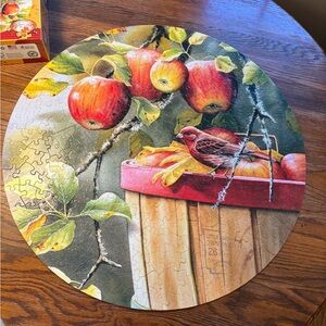 *3 Puzzles for 20
Serendipity 26” Round Puzzle with Apple Harvest Design & Bird